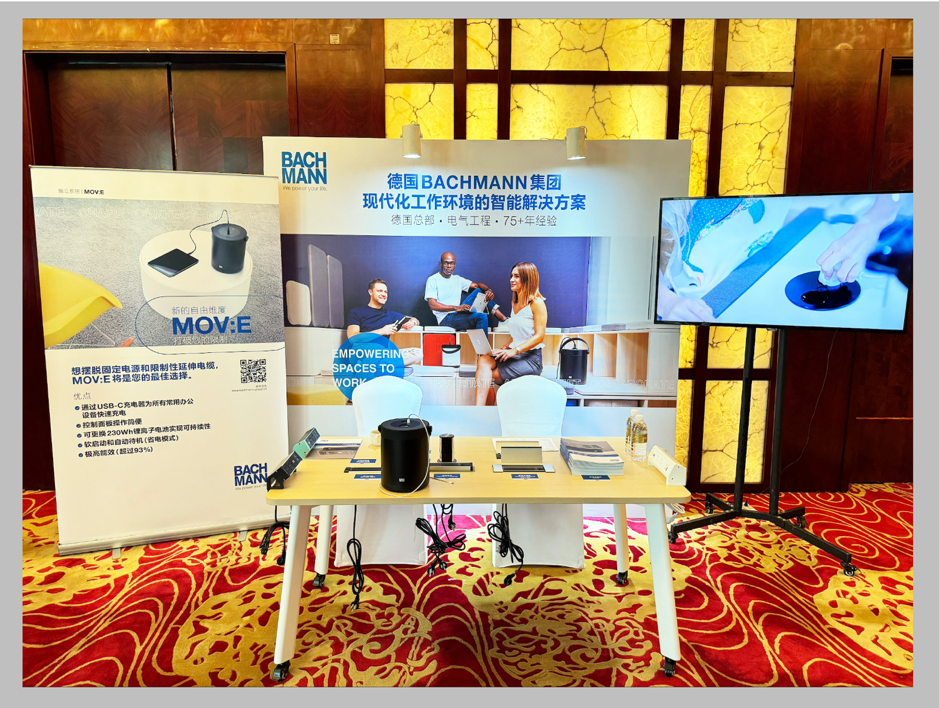 A table with a sign and a monitorAI-generated content may be incorrect.